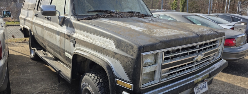 square body suburban with choo choo customs graphics